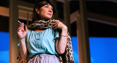 Sharon (Susi Damilano) begins to get into the spirit of her French Rosetta Stone lessons.