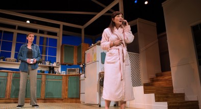 Robyn (Julia Brothers) watches as Sharon (Susi Damilano) makes a crucial phone call.