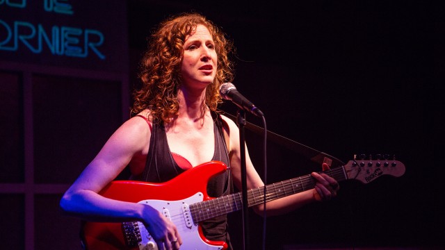 Kate (Jessica Bates*) performs at a local bar after work. Photo by Jessica Palopoli.