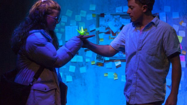 Sherri (Melissa Quine*) receives a gift from That Guy (Max Forman-Mullin). Photo by Ken Levin.