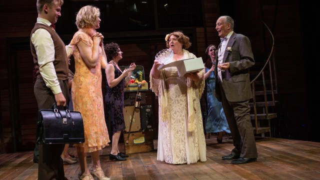 Clifford Bradshaw (Atticus Shaindlin*) and Sally Bowles (Cate Hayman*) greet the party's hosts Fräulein Schneider (Jennie Brick*) and Herr Schultz (Louis Parnell*) in 'Cabaret' at San Francisco Playhouse.