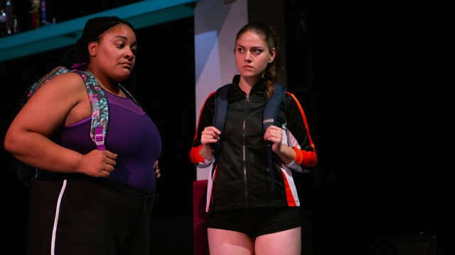Amina (Indiia Wilmott) and Sofia (Ash Malloy) discuss their upcoming competition.