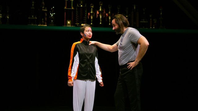 Zuzu (Krystle Piamonte) gets coached by Dance Teacher Pat (Liam Robertson).