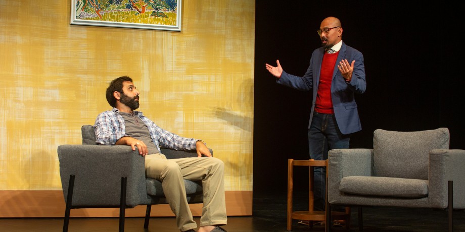 Yvan (Bobak Bakhtiari*) and Marc (Jomar Tagatac*) discuss their friend's unexpected purchase.