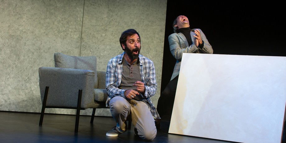 Yvan (Bobak Bakhtiari*) and Serge (Johnny Moreno*) laugh about Serge's new painting.