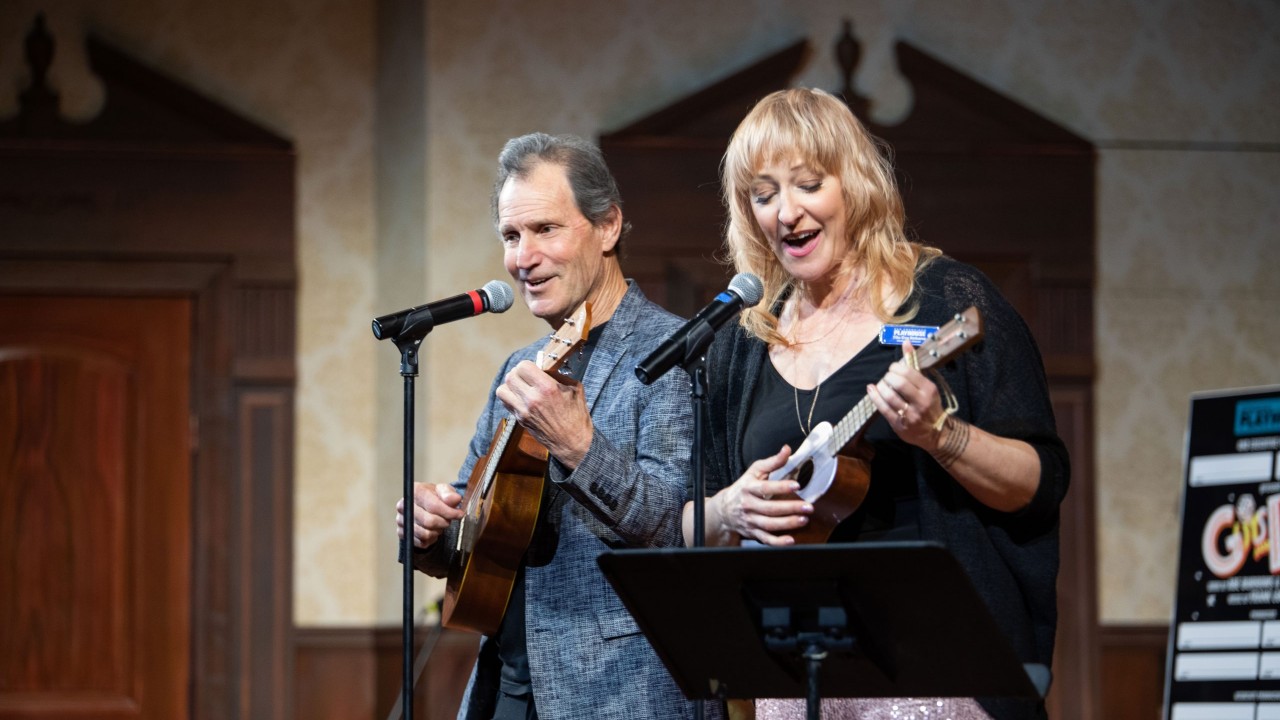 Artistic Director Bill English and Development Director Tiiu Eva Rebane perform a song at the Season Announcement Party.