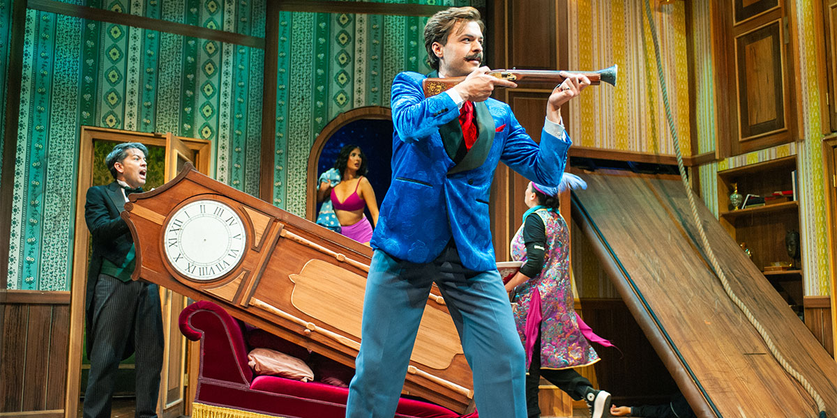 Adam Griffith and the cast of The Play That Goes Wrong (2024) as the set falls down around them.